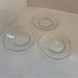 Set of three clear glass vintage small round plates